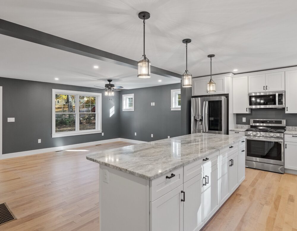 A modern contemporary kitchen room interior in white and gray colors